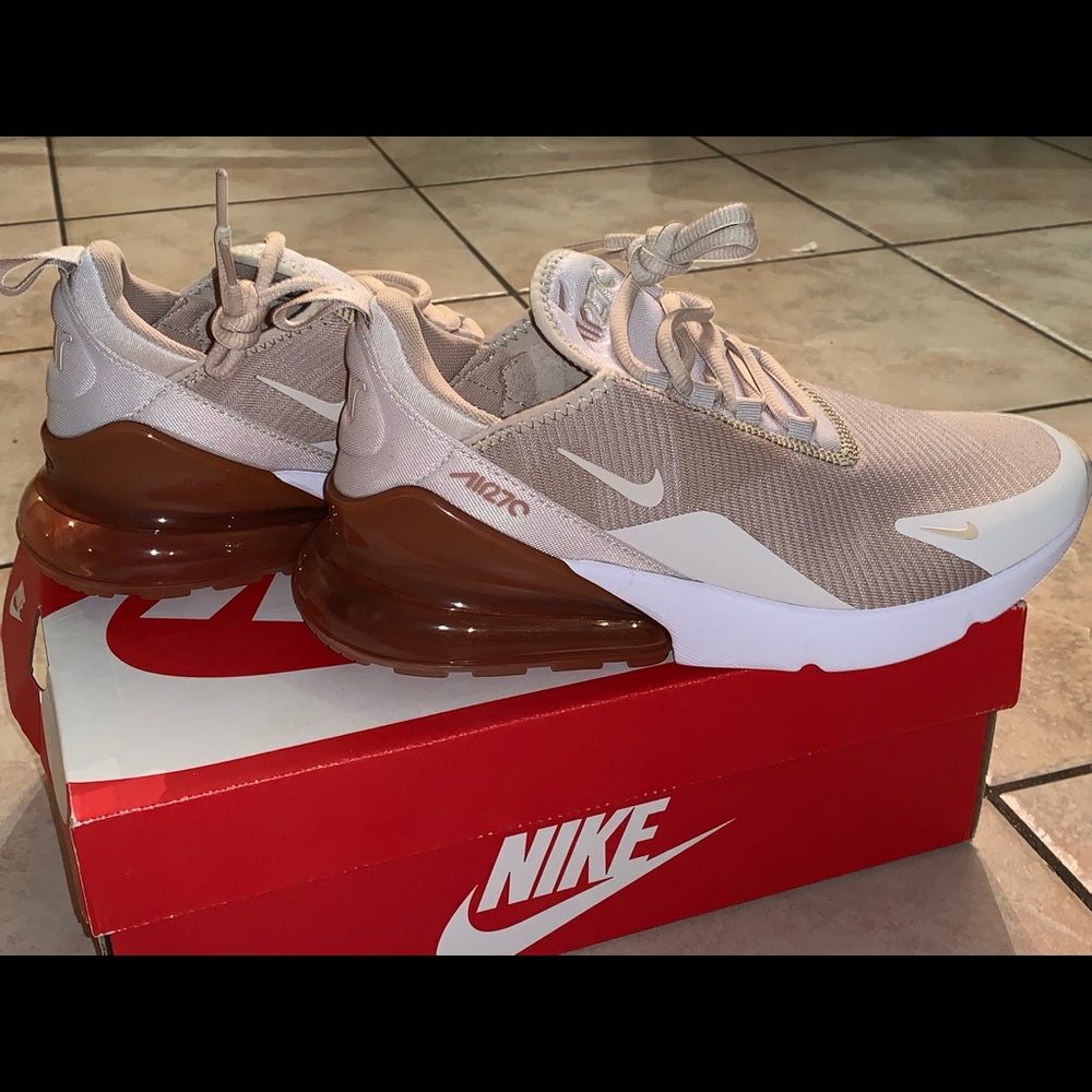 Brand new.  Never worn, boys size 7 Nike 270